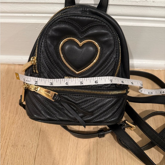 Michael Kors Quilted Black Backpack with Gold Heart Detail - Picture 8 of 11